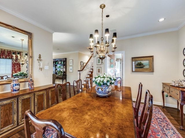 dining space with an inviting chandelier, ornamental molding, and dark hardwood / wood-style flooring