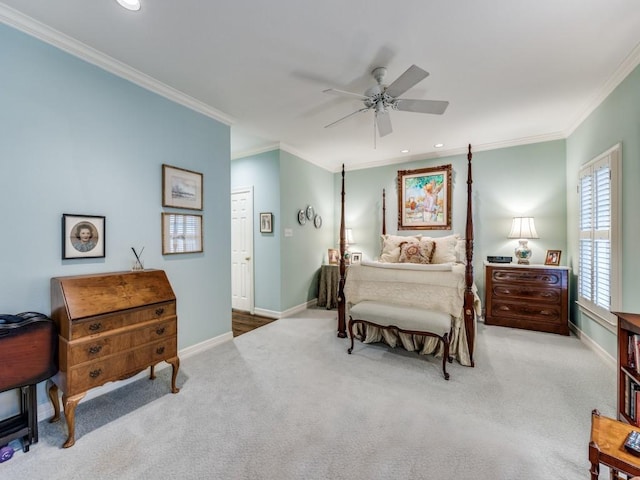 carpeted bedroom with crown molding and ceiling fan