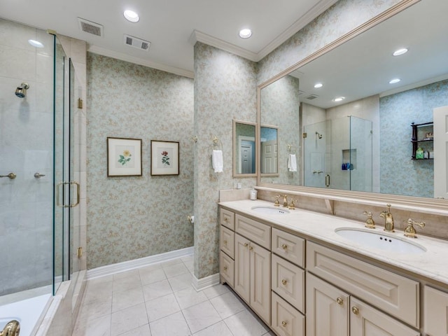 bathroom with crown molding, vanity, tile patterned floors, and a shower with shower door