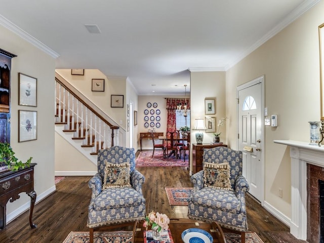 living room featuring ornamental molding, dark hardwood / wood-style floors, and a fireplace