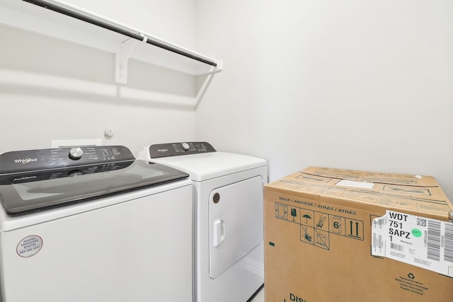 laundry room with washing machine and dryer