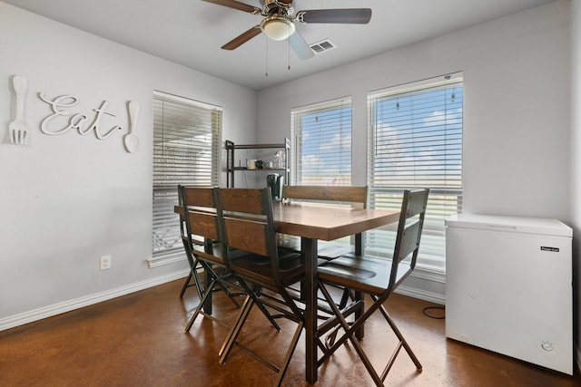 dining space featuring ceiling fan