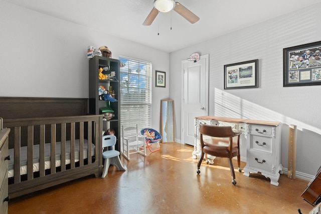 bedroom with ceiling fan and concrete floors