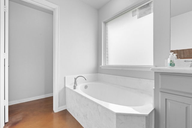 bathroom featuring vanity and a bathtub