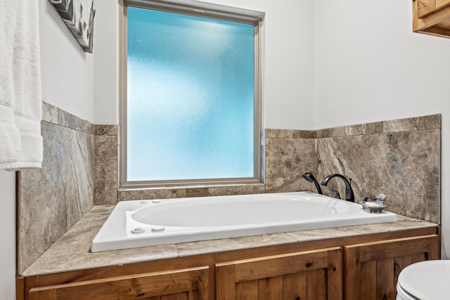 bathroom with a washtub