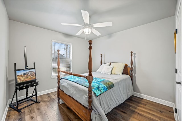 bedroom featuring ceiling fan and dark wood-type flooring