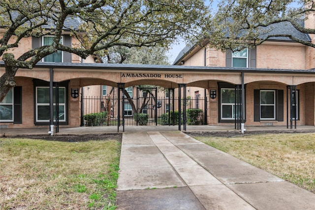 exterior space featuring a front lawn