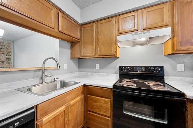 kitchen featuring sink, a textured ceiling, and black appliances