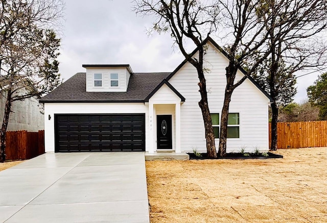 modern farmhouse style home with a garage