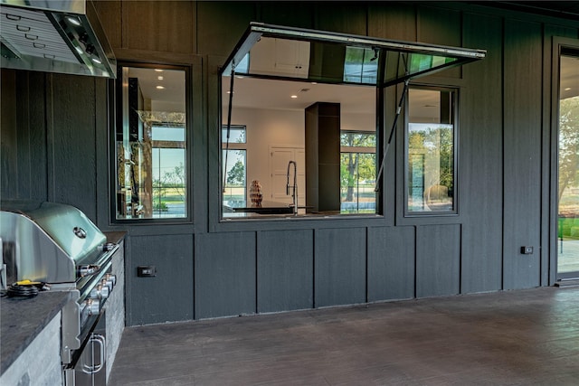 view of patio featuring area for grilling and sink