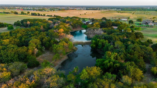 drone / aerial view with a rural view and a water view