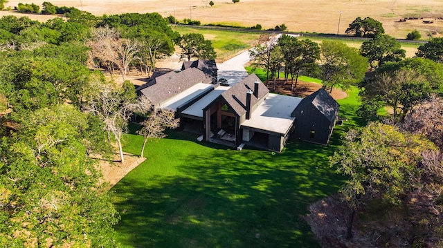 birds eye view of property featuring a rural view