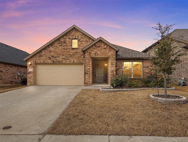 view of front of property featuring a garage