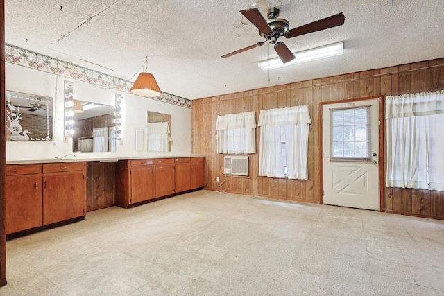 1806 Duck Creek Rd, Sanger, TX 76266 - bathroom featuring wooden walls, a textured ceiling, tile patterned floors, and a ceiling fan
