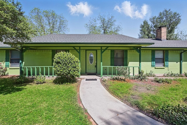 1806 Duck Creek Rd, Sanger, TX 76266 - single story home featuring brick siding, a porch, a shingled roof, and a front yard