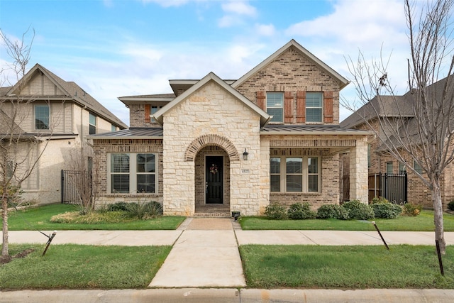 view of front of house with a porch and a front lawn