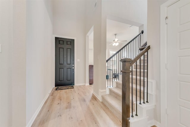 entryway featuring light hardwood / wood-style flooring and ceiling fan