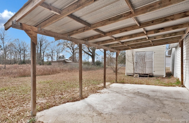 10553 White Oak Dr, Keithville, LA 71047 - view of patio with a storage shed