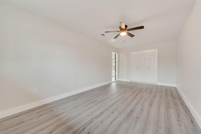 unfurnished room with ceiling fan and light hardwood / wood-style flooring