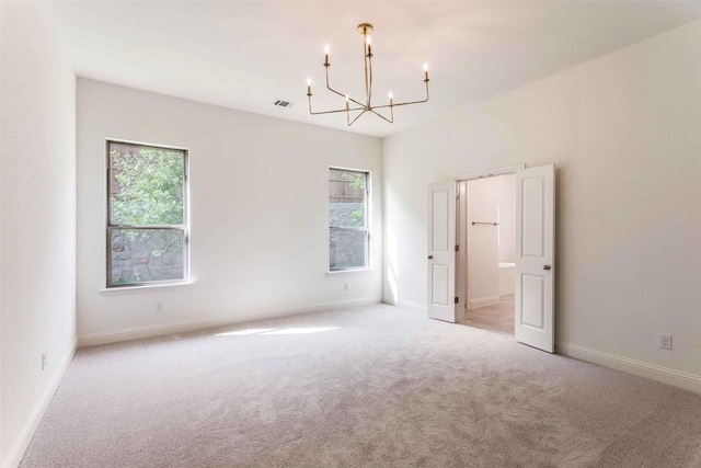 782 Sterling Dr, Benbrook, TX 76126 - carpeted empty room featuring a chandelier, healthy amount of natural light, and baseboards