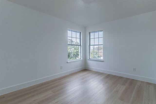 empty room featuring light hardwood / wood-style floors