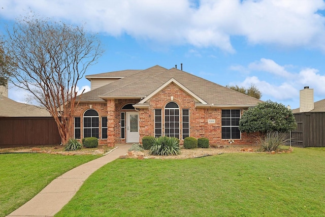 view of front facade with a front yard