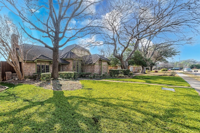 exterior space featuring a front lawn