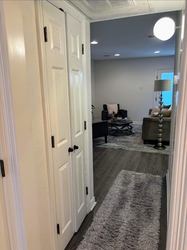 2722 Knight St Unit 316C, Dallas, TX 75219 - hall featuring dark wood-style flooring and baseboards