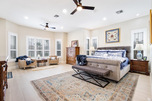 bedroom featuring ceiling fan and light hardwood / wood-style flooring