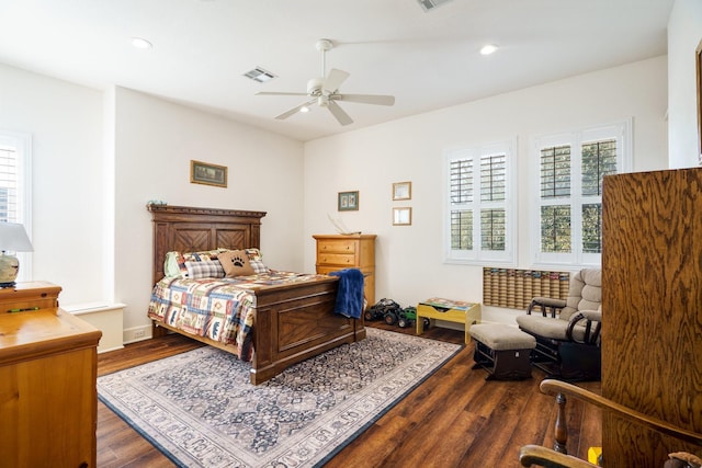 bedroom featuring dark wood-type flooring and ceiling fan