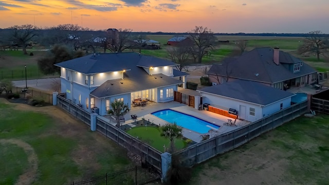 view of aerial view at dusk