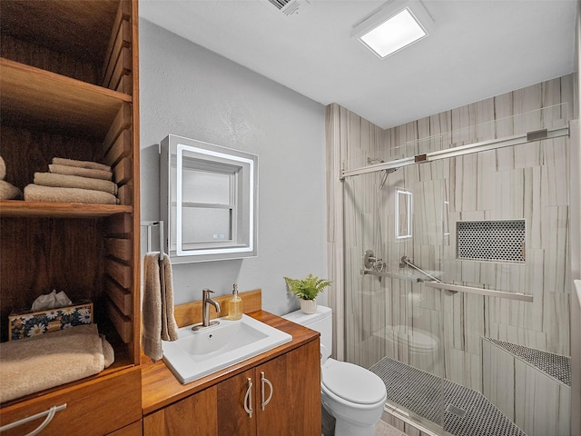 bathroom featuring vanity, radiator, an enclosed shower, and toilet