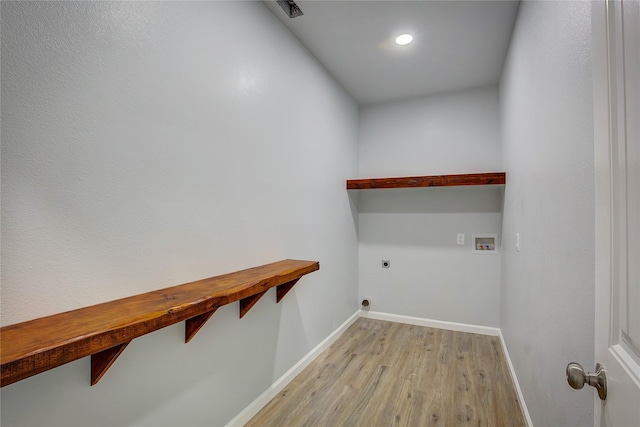 4340 Fm 1563, Wolfe City, TX 75496 - clothes washing area with baseboards, washer hookup, hookup for an electric dryer, and laundry area