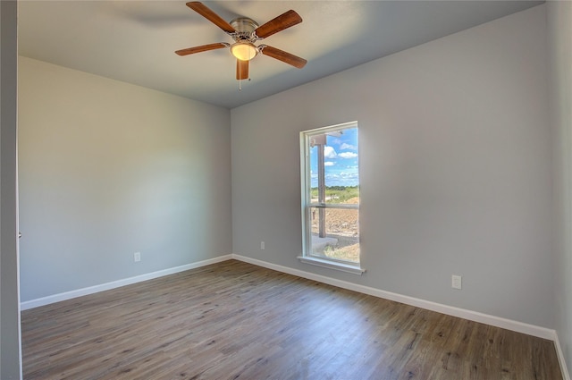 4340 Fm 1563, Wolfe City, TX 75496 - unfurnished room featuring wood finished floors, baseboards, and ceiling fan
