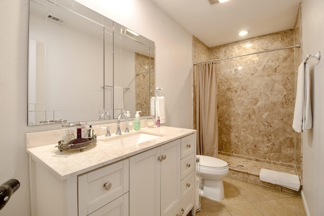 full bath with visible vents, toilet, tile patterned floors, vanity, and a shower stall