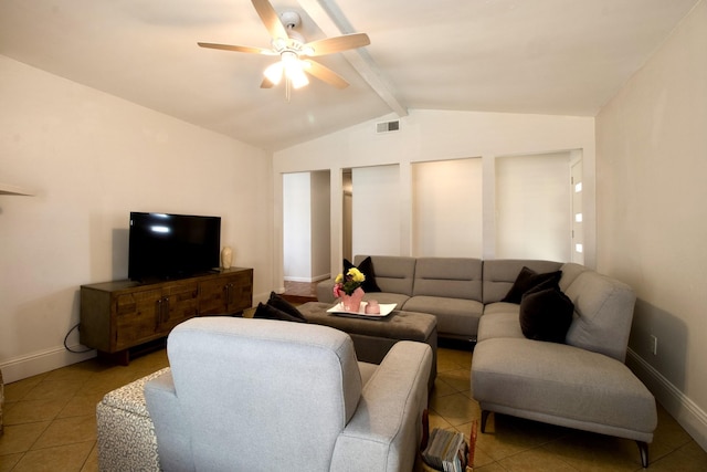 tiled living room featuring visible vents, vaulted ceiling with beams, baseboards, and ceiling fan