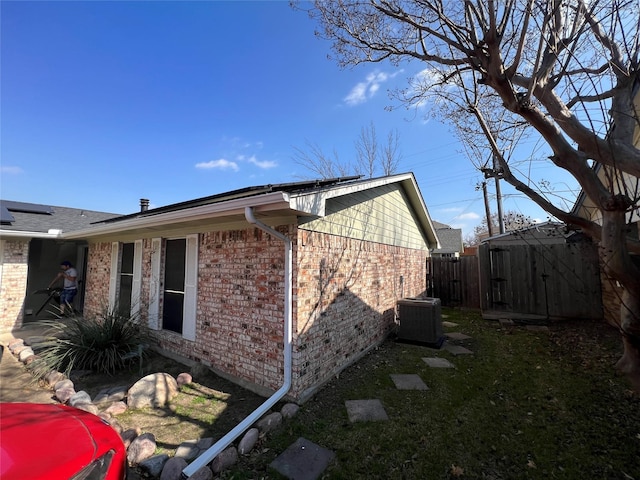 view of home's exterior with central air condition unit