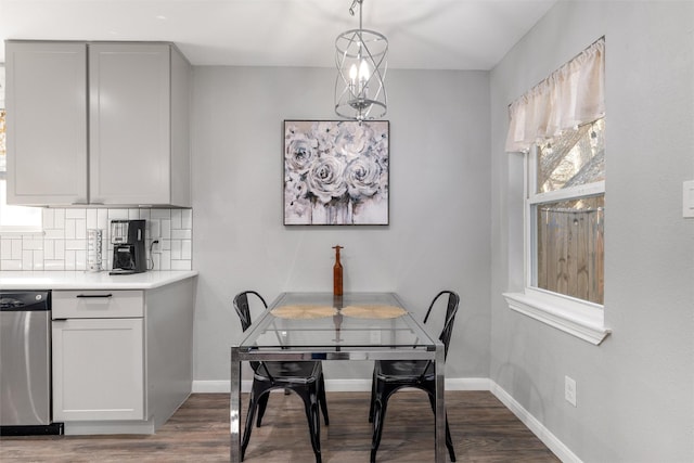 dining space featuring dark hardwood / wood-style flooring