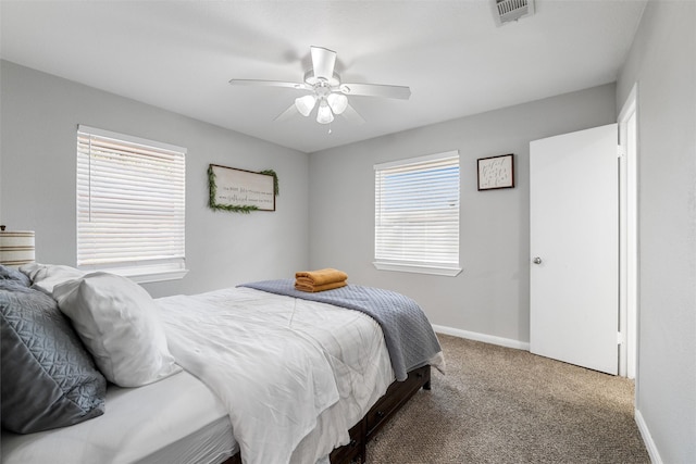 bedroom with ceiling fan and carpet flooring