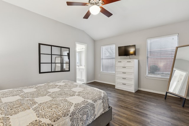 bedroom with lofted ceiling, connected bathroom, dark wood-type flooring, and ceiling fan