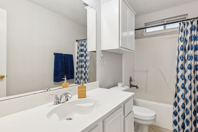 full bathroom with vanity, shower / tub combo, tile patterned floors, and toilet