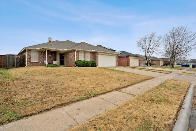 ranch-style home featuring a garage, concrete driveway, a chimney, fence, and brick siding