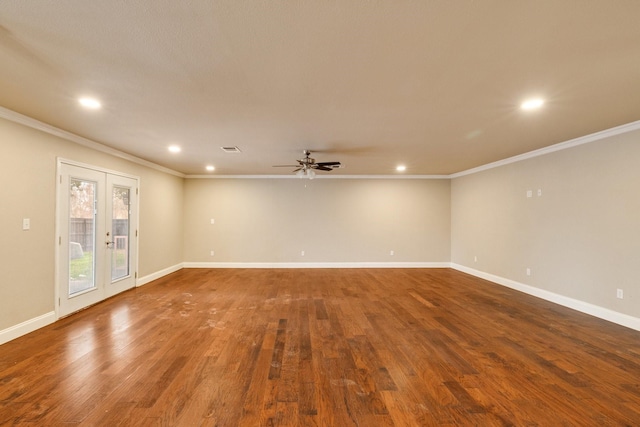 spare room with french doors, ornamental molding, wood-type flooring, and ceiling fan