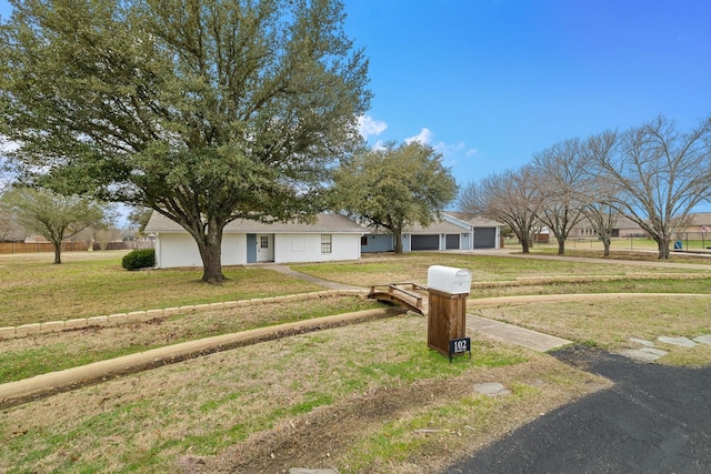 ranch-style house with a front yard