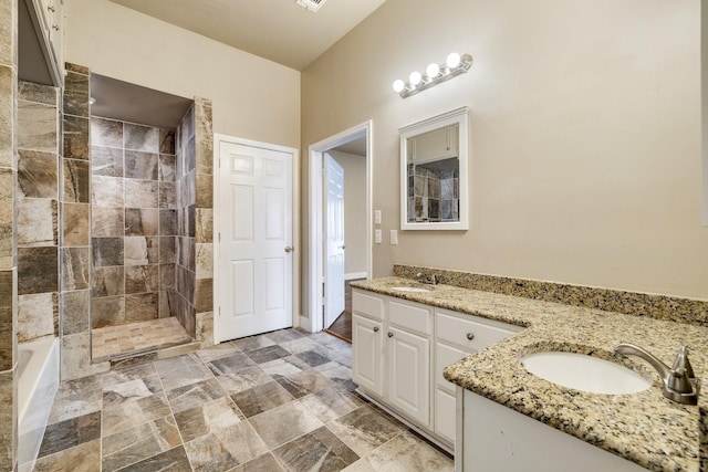 bathroom featuring vanity and shower with separate bathtub