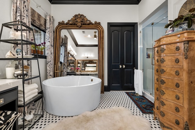 bathroom featuring ornamental molding, separate shower and tub, and vanity