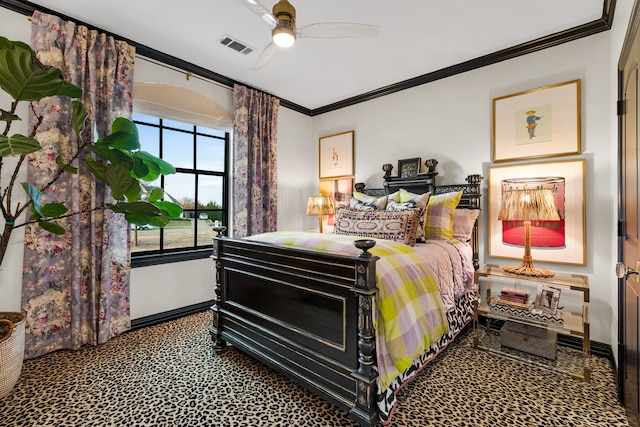 bedroom with crown molding, carpet floors, and ceiling fan