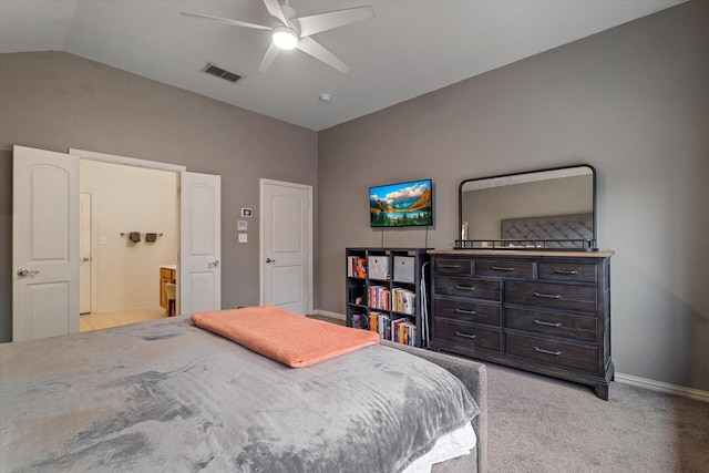 carpeted bedroom featuring lofted ceiling and ceiling fan