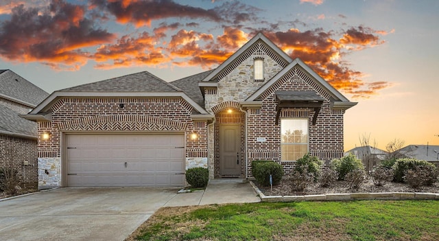 view of front of property with a garage