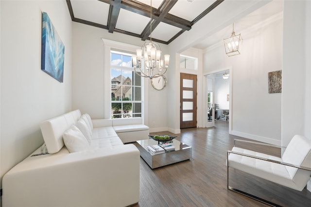 living room featuring baseboards, coffered ceiling, wood finished floors, beamed ceiling, and a chandelier